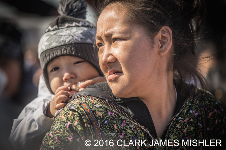 Hannah Killigvuk and her son, Lazarus, Unagsiksiksauq (Clan Boat Celebration), Qagruq (Whaling Feast), Point Hope / Photo by Clark James Mishler